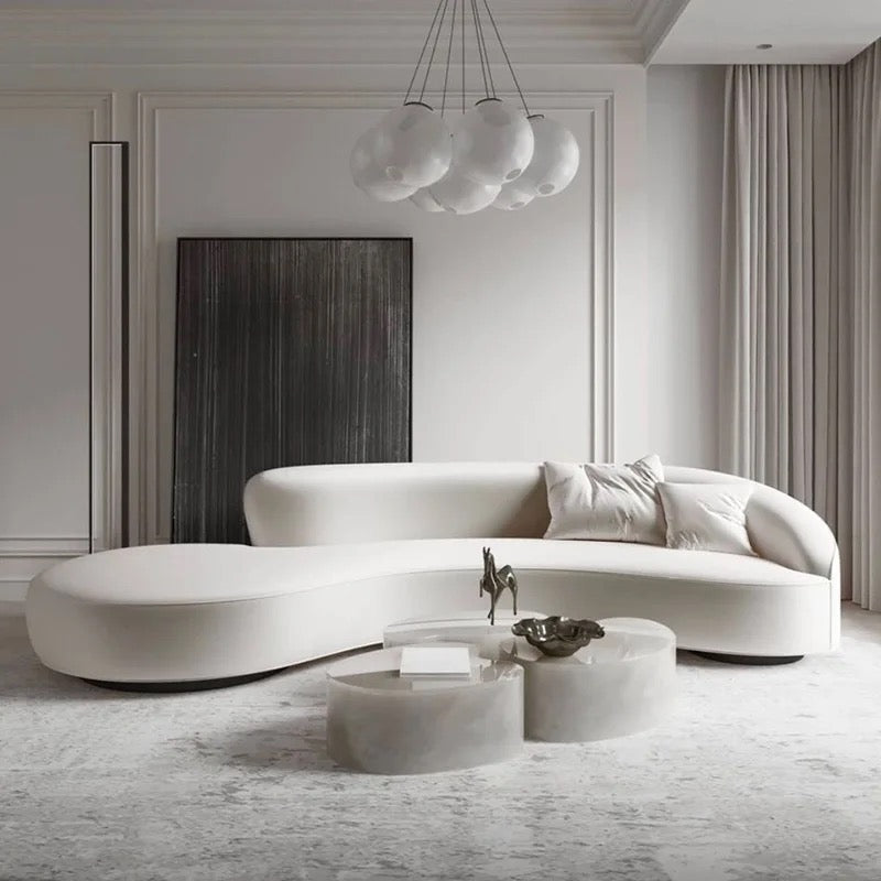 Timeless Elegance: The Allure of Canewood Furniture, Block Marble Coffee Tables, and Curved Sectional Sofas